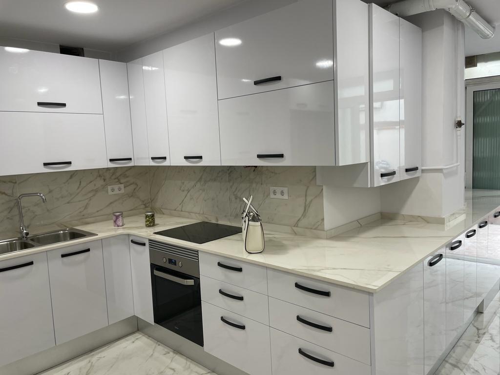 Modern renovated kitchen 1 by Reformes i Construccions Bonilla