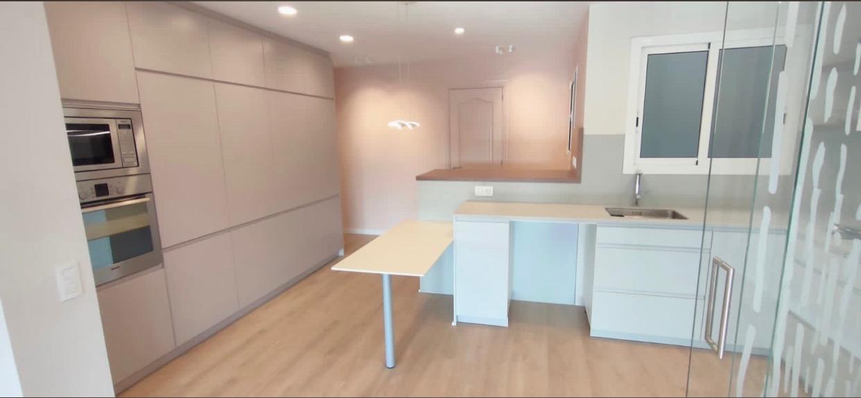 Modern renovated kitchen 2 by Reformes i Construccions Bonilla